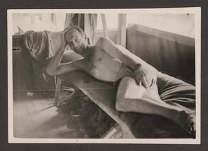 [Whitehill Laying on Cot]