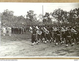 NEW GUINEA. 1943-11-20. NX8 LIEUTENANT GENERAL SIR LESLIE MORSHEAD KCB KBE CMG DSO ED, GENERAL OFFICER COMMANDING, NEW GUINEA FORCE (1), TAKING THE SALUTE FROM UNITS OF THE 18TH AUSTRALIAN INFANTRY ..