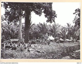 MALMAL VILLAGE, JACQUINOT BAY. NEW BRITAIN. 1944-12-09. THE HEADQUARTERS 5 DIVISION UNIT CAMP VIEWED NORTHEAST FROM THE POSTAL UNIT TENT