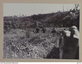 WEWAK AREA, NEW GUINEA. 1945-05-10. TROOPS OF 2/4 INFANTRY BATTALION SUPPORTED BY MATILDA TANKS OF 2/4 ARMOURED REGIMENT, IN THEIR ADVANCE AGAINST JAPANESE FORCES ENTRENCHED IN CAVES, TUNNELS AND ..