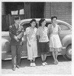 Even army life in war time has its happy moments. Witness Sgt. Joe Nikei, Nisei veteran from Hawaii, being entertained