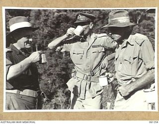 KUMBARUM, NEW GUINEA. 1943-11-14. MAJOR GENERAL J. S. LETHBRIDGE, CBE, MC, (LEFT); VX9 MAJOR GENERAL G. A. VASEY, CB, CBE, DSO, GENERAL OFFICER COMMANDING 7TH AUSTRALIAN DIVISION (CENTRE) AND NX3 ..