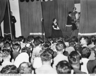 A scene from "Song of Poland" during the No. 19 Lines of Communication area signals revue "Over to You". It was held at the unit's recreation hut which was known as the "Mercury Theatre" for the ..