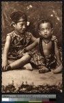 Two Samoan children sitting on a mat, Samoa, ca.1900-1930