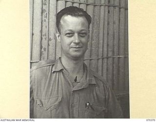 MILNE BAY, NEW GUINEA, 1944-01-11. NX88105 CORPORAL H. HOWELL, DETACHMENT Z FIELD SECURITY SECTION, ATTACHED TO THE MILNE BAY BASE SUB AREA