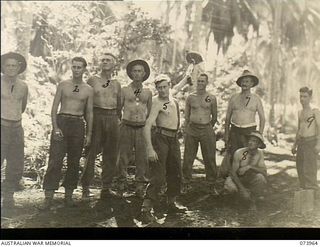 MADANG, NEW GUINEA. 1944-06-17. TROOPS PARTICIPATING IN THE "THROWING THE COCONUT" EVENT DURING THE TABLOID SPORTS MEETING CONDUCTED BY HEADQUARTERS 15TH INFANTRY BRIGADE WITHIN THE SIAR ..