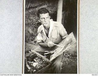 PORT MORESBY, PAPUA, NEW GUINEA. 1943-01-18. SX13471 SERGEANT G.R. MAINWARING, OFFICIAL WAR ARTIST, AUSTRALIAN MILITARY HISTORY SECTION, ATTACHED TO HEADQUARTERS, NEW GUINEA FORCE