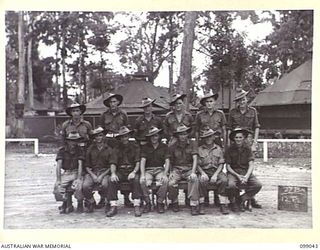 TOROKINA, BOUGAINVILLE. 1945-11-24. PERSONNEL OF 12 PLATOON, B COMPANY, 27 INFANTRY BATTALION. (FOR IDENTIFICATION OF 13 NAMED PERSONNEL REFER TO PROVISIONAL CAPTION OR NAME INDEX)