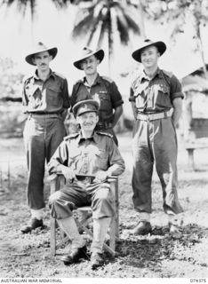 SIAR, NEW GUINEA. 1944-06-27. OFFICERS OF HEADQUARTERS, 15TH INFANTRY BRIGADE. THEY ARE:- VX24235 BRIGADIER H.H. HAMMER, DSO, COMMANDING OFFICER (1); VX104157 CAPTAIN T.A. MOLOMBY (2); SX649 ..