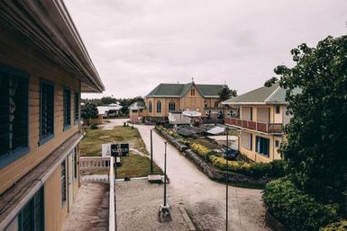 Church with satellite and solar panels in front, Nukunonu, Tokelau