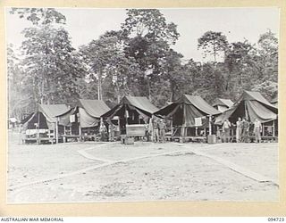 YALU AREA, NEW GUINEA, 1945-07-30. THE CAMP AREA, NO. 2 PLATOON, 2/1 FORESTRY COMPANY, ROYAL AUSTRALIAN ENGINEERS, PHOTOGRAPHED AT THE REQUEST OF THE COMMANDING OFFICER