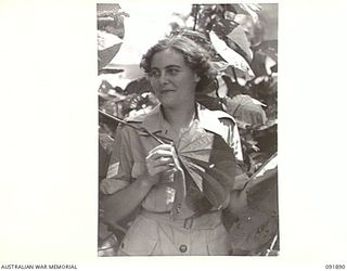 LAE, NEW GUINEA, 1945-05-18. SERGEANT M. JONES, AUSTRALIAN WOMEN'S ARMY SERVICE BARRACKS, PARTICIPATING IN A TOUR CONDUCTED BY ARMY AMENITIES SERVICE FOR AUSTRALIAN WOMEN'S ARMY SERVICE PERSONNEL ..