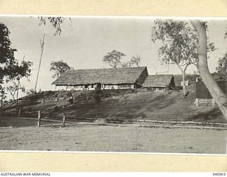 PORT MORESBY, NEW GUINEA. 1943-12. ONE OF THE HUTS OCCUPIED BY HEADQUARTERS, SUPPLY AND TRANSPORT SERVICE, NEW GUINEA FORCE