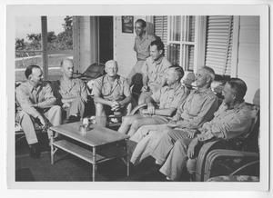 [Admiral Chester W. Nimitz Sits with CINCPAC Staff on Porch]