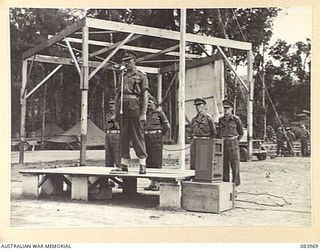 TOROKINA, BOUGAINVILLE, SOLOMON ISLANDS. 1944-12-15. MAJOR GENERAL W. BRIDGEFORD, GENERAL OFFICER COMMANDING 3RD DIVISION, (1), ADDRESSING 47 INFANTRY BATTALION, 29 INFANTRY BRIGADE TROOPS ON ..