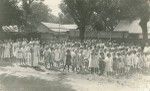 Pupils of Papeete Girls' school on the playground, ready to return to their classrooms