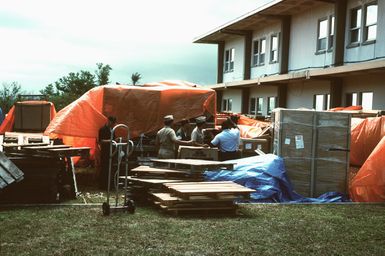 Navy Seabees from Navy Mobile Construction Battalion Four (NMCB-4) assigned to Naval Facilities Guam help prepare Apra Harbor for personnel and equipment as the Navy relinquishes Subic Bay back to the Philippine Government. EXACT DATE SHOT UNKNOWN