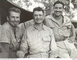 1943-06-18. NEW GUINEA. THE SMITH FLYING FAMILY, SOMEWHERE IN NEW GUINEA, CAPTAIN WILLIAM ANDREW, "BILL" SMITH, HIS FATHER COLONEL ANDREW WILLIAM SMITH, KNOWN AS "LITTLE ANDY", AND A YOUNGER SON ..