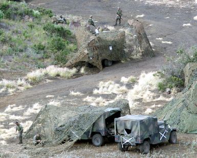 The evaluators for the 3rd Marine Regiment set up camp and prepare for the work day in the Pohakuloa Training Area, Hawaii