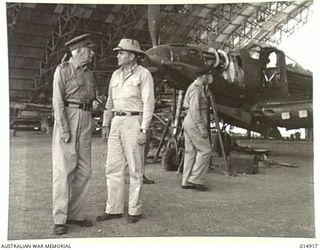 NEW GUINEA: GOVERNOR-GENERAL, LORD GOWRIE, VISITS NEW GUINEA. LORD GOWRIE INSPECTS AN AMERICAN AIRCRAFT WORKSHOP