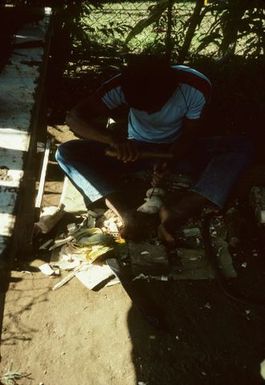 Carver in Nau's workshop, Nuku'alofa, Tonga June 1984