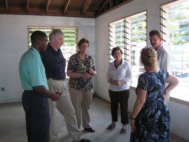 Earthquake ^ Tsunami - Amanave Village, American Samoa, April 16, 2010 -- Deputy Administrator Richard Serino (blue shirt) with Region 9 Administrator Nancy Ward (print shirt) and Deputy Associate Administrator, Response and Recovery, Beth Zimmerman (white shirt) visit a house under construction. The house is part of FEMA's pilot project to construct permanent houses on American Samoa. FEMA/David Bibo