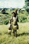 Woman and two children at Kiunga Station, 1958