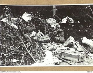KAKAKOG AREA, NEW GUINEA, 1943-10-02. AMMUNITION WHICH WAS ABANDONED BY THE JAPANESE, DURING THE HEAVY FIGHTING IN THE AREA