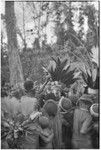 Bride price ritual: bride (center) and crowd of kin