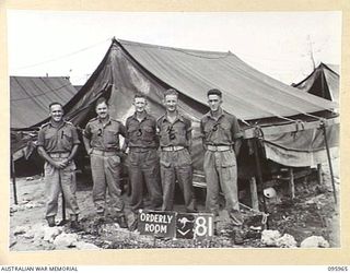 CAPE WOM, WEWAK AREA, NEW GUINEA. 1945-08-31. ORDERLY ROOM PERSONNEL, HEADQUARTERS ROYAL AUSTRALIAN ENGINEERS 6 DIVISION