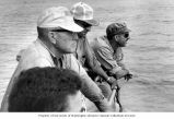 Research team members approaching the shore of Enjebi Island, summer 1964