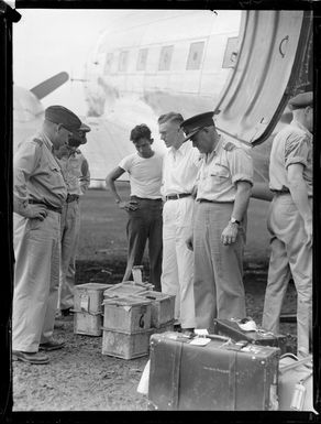 The arrival of Zanzibar wasps at Faleolo Airport early morning with unidentified military and civilian personnel looking on, Western Samoa