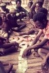 Men readying pearlshells and currency (money) for ceremonial distribution