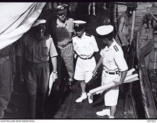 OCEAN ISLAND. 1945-09-30. THE JAPANESE ENVOY GOING ABOARD HMAS DIAMANTINA TO NEGOTIATE THE SURRENDER OF APPROXIMATELY 530 JAPANESE TROOPS ON THE ISLAND