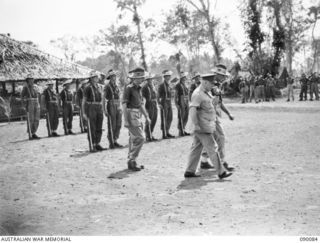 AITAPE, NEW GUINEA. 1945-03-19. GENERAL SIR THOMAS A. BLAMEY, COMMANDER-IN-CHIEF, ALLIED LAND FORCES, SOUTH WEST PACIFIC AREA (2), AND MAJOR G.C. DARLING, SECOND IN CHARGE, 2/5 INFANTRY BATTALION ..