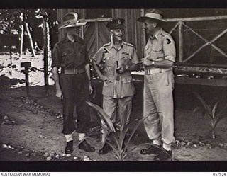 DOBODURA, NEW GUINEA. 1943-10-11. NX366 MAJOR GENERAL A. J. BOASE CBE, GENERAL OFFICER COMMANDING, 11TH AUSTRALIAN DIVISION (CENTRE), WITH SX3200 LIEUTENANT COLONEL J. C. IRWIN, GENERAL STAFF ..