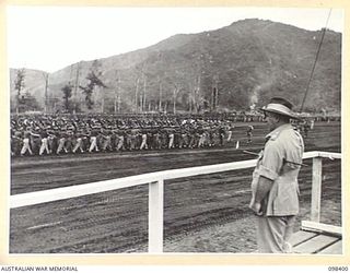 RABAUL, NEW BRITAIN. 1945-10-28. A CEREMONIAL PARADE AND MARCH PAST BY TROOPS OF 11 DIVISION WAS INSPECTED BY GENERAL SIR THOMAS A. BLAMEY, COMMANDER-IN-CHIEF, ALLIED LAND FORCES, SOUTH WEST ..