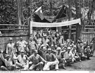 KUMUIA YAMA, RABAUL AREA, NEW BRITAIN. 1945-09-17. A CHINESE PLATOON, PART OF A COMPLETE UNIT BROUGHT FROM SINGAPORE BY THE JAPANESE TO WORK IN NEW BRITAIN DURING THE JAPANESE OCCUPATION. THEY ARE ..
