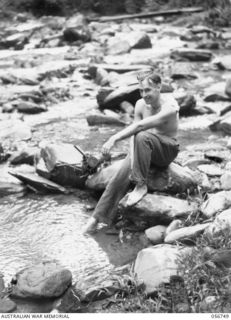 SALAMAUA AREA, NEW GUINEA. 1943-07-22. TX708 CAPTAIN M. WALTERS, OFFICER COMMANDING, "A" COMPANY, 2/5TH BATTALION, WOUNDED IN THE FIGHTING IN THE MOUNT TAMBU AREA. HE WAS LATER AWARDED THE MILITARY ..