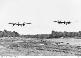 1943-04-13. NEW GUINEA. LOCKHEED LIGHTNINGS (P38) IN FLIGHT. (NEGATIVE BY N. BROWN)