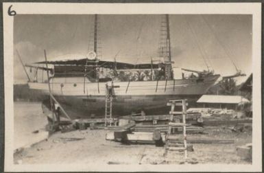 Cleaning the bottom of a Japanese schooner, New Britain Island, Papua New Guinea, approximately 1916