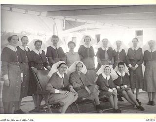 LAE, NEW GUINEA. 1944-08-18. NFX70205 MATRON L.A. STATON AND MEMBERS OF HER NURSING STAFF ABOARD THE 2/1ST HOSPITAL SHIP, "MANUNDA"