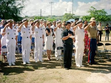 Distinguished guests salute during the dedication ceremony for the Congressional Medal of Honor Monument. The monument honors four Marines for their heroism above and beyond the call of duty while fighting Japanese troops during World War II. They are Captain Louis Wilson Jr., Private Leonard Mason, Private Luther Skaggs and Private Frank Witek