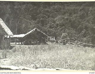 ILOLO - KOKODA, NEW GUINEA. 1944-04-30. THE LOCATION OF THE REGIMENTAL AID POST VIEWED FROM THE SOUTH AT IORIBAIWA SIGNAL CAMP, 18TH AUSTRALIAN LINES OF COMMUNICATION SIGNALS