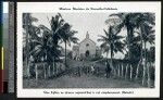 Tree-lined road leading to a stone church at Balade, New Caledonia, ca.1900-1930