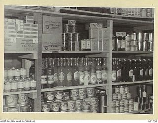 TOROKINA, BOUGAINVILLE. 1945-04-19. INSIDE THE RED CROSS STORE AT 2/3 CONVALESCENT DEPOT SHOWING A FEW OF THE GOODS SUPPLIED TO TROOPS