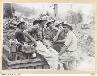 RABAUL, NEW BRITAIN. 1945-11-13. 3. PERSONNEL OF 11 DIVISION, ROYAL AUSTRALIAN ENGINEERS, ABOUT TO EMBARK ON THE MANGOLA DURING THE DEPARTURE OF THE FIRST HIGH PRIORITY PERSONNEL UNDER THE ..