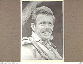 MILNE BAY, PAPUA. 1942-09. FLYING OFFICER M.S. BOTT, SERVING WITH 76 FIGHTER SQUADRON RAAF IN NEW GUINEA