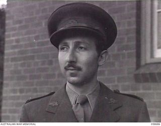 TERAPO, NEW GUINEA. 1943-09-16. PORTRAIT OF VX138619 LIEUTENANT JOHN LEE, PHOTOGRAPHER, AUSTRALIAN MILITARY HISTORY SECTION