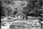 Yagip River: people wading across